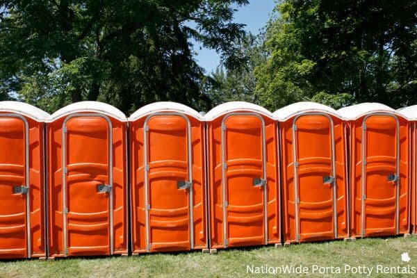 a lineup of clean and well-maintained portable loos for workers in Washington