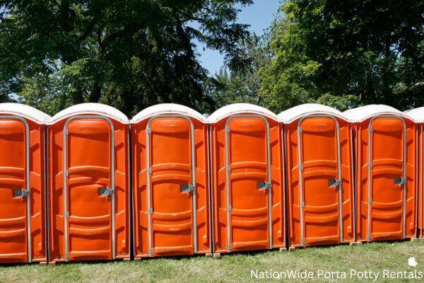 a lineup of clean and well-maintained portable loos for workers in Coulee Dam, WA